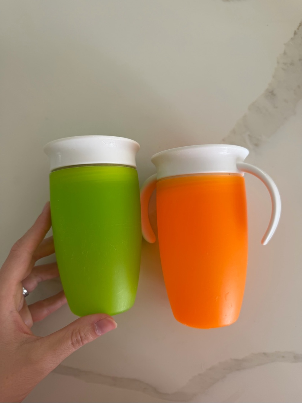Green and Orange Silicone Sippy Cups with White Lids